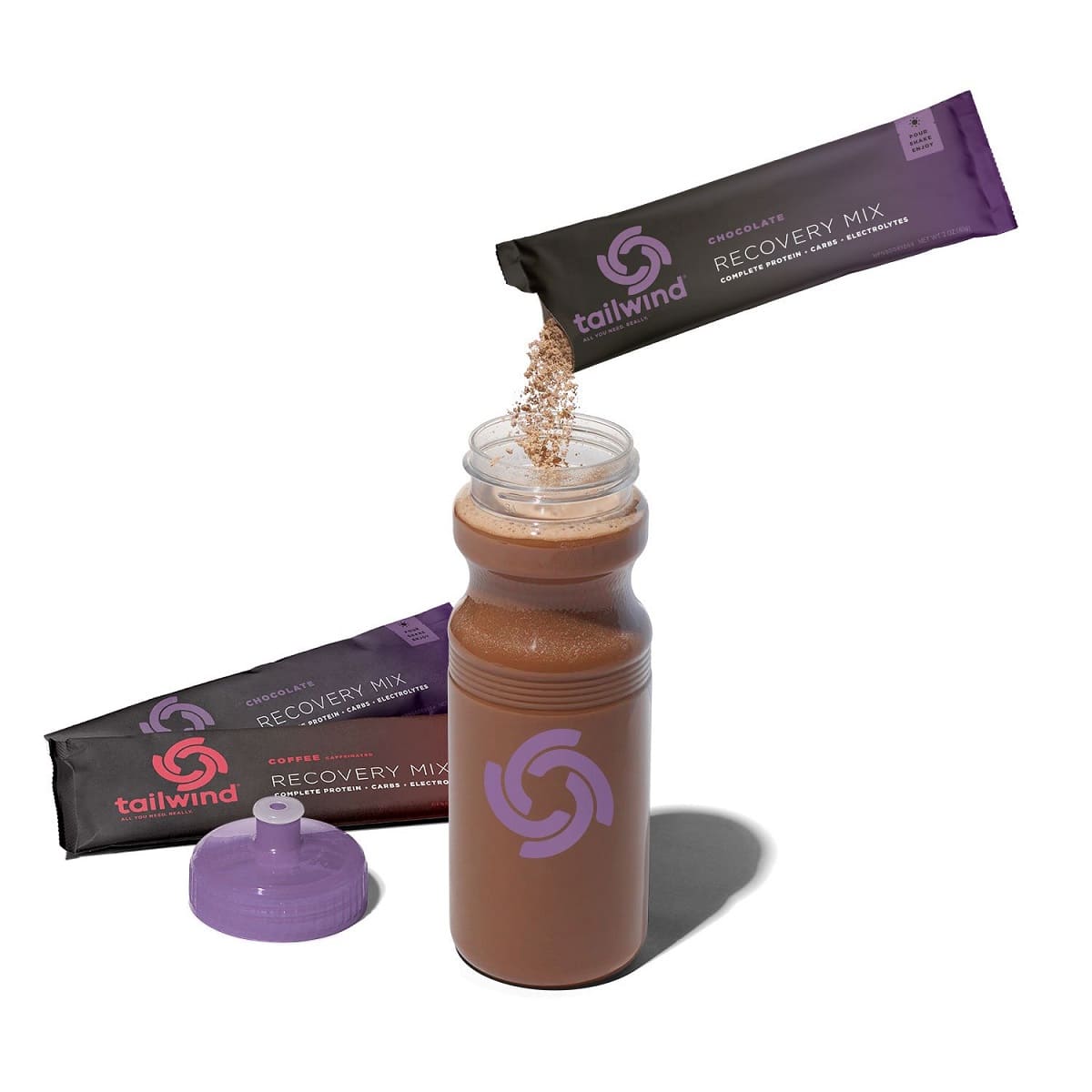 Recovery mix being poured into a water bottle 